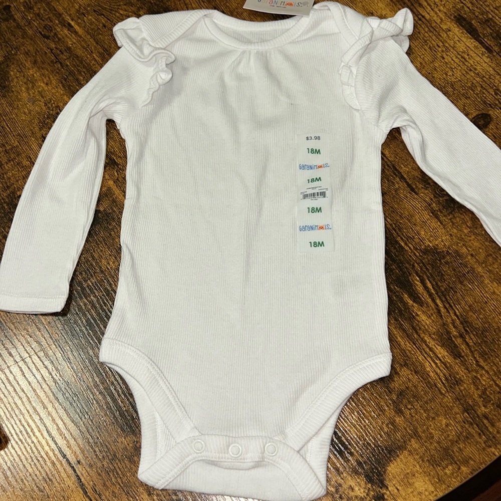 18 Months white long sleeve onesie, one pair jeans and 2 pair jeggings NWT